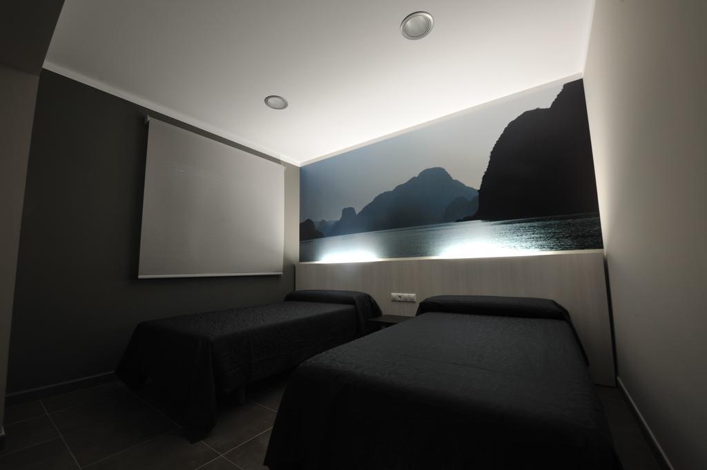 Aparthotel Meseguer Alcañiz Rum bild